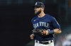 FILE - Seattle Mariners' Mitch Haniger jogs off the field during the second game of a baseball doubleheader against the Los Angeles Angels on Aug. 6, 2022, in Seattle. Haniger and the San Francisco Giants agreed on a $43.5 million, three-year contract Tuesday, Dec. 6, 2022, at the winter meetings. (AP Photo/Stephen Brashear, File)
