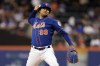 FILE - New York Mets pitcher Taijuan Walker throws during the first inning of the team's baseball game against the Los Angeles Dodgers on Aug. 30, 2022, in New York. The Philadelphia Phillies added Walker to their rotation on Tuesday, Dec. 6, agreeing to a $72 million, four-year contract with the right-hander.A person familiar with the negotiations confirmed the move to The Associated Press on condition of anonymity because it was pending a physical. (AP Photo/Adam Hunger, File)