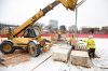 MIKE DEAL / WINNIPEG FREE PRESS
A stone mason crew carefully remove the tyndall stone plinth that supported the statue of Queen Victoria before it was toppled during a Canada Day protest in 2021.