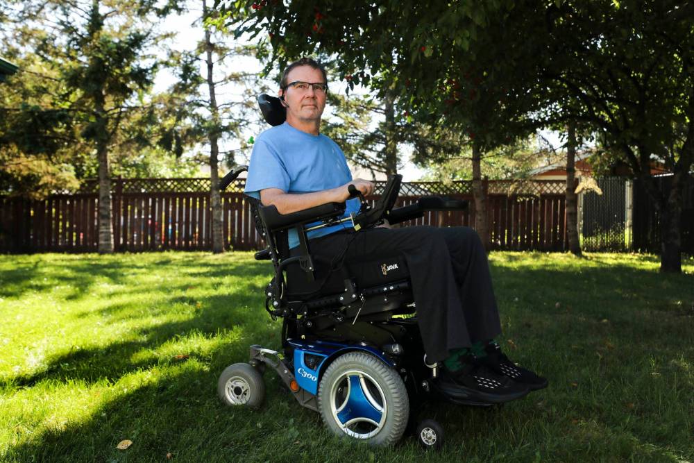 RUTH BONNEVILLE / WINNIPEG FREE PRESS FILES
Quadriplegic Patrick Dram says home care isn’t always able to carry out four daily scheduled visits and he is often left in limbo. He welcomes the new online program.
