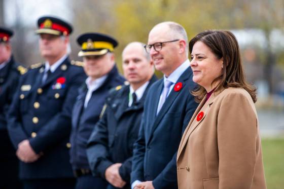 Premier Heather Stefanson (far right) announced funding to create a unit dedicated to tracking down high-risk criminals. (Mikaela MacKenzie / Winnipeg Free Press files)