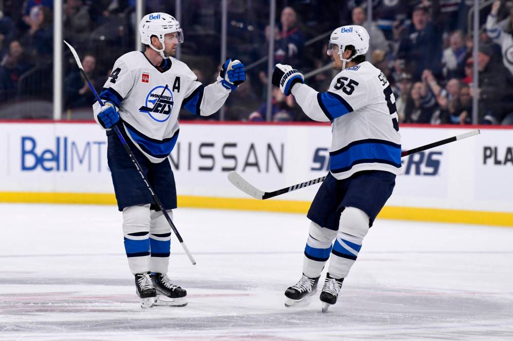 FRED GREENSLADE / THE CANADIAN PRESS
Winnipeg Jets’ Josh Morrissey (44) and Mark Scheifele (55) are two potential candidates to be named captain of the Winnipeg Jets.