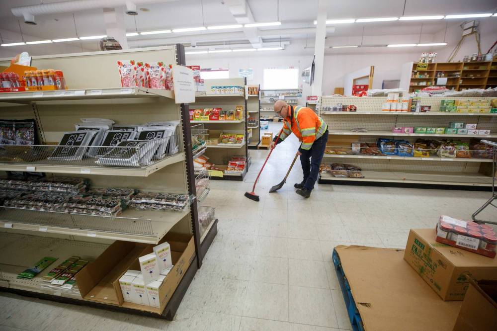 MIKE DEAL / WINNIPEG FREE PRESS
                                Vandals have thrown rocks through Tsang's windows several times over the past three years.
