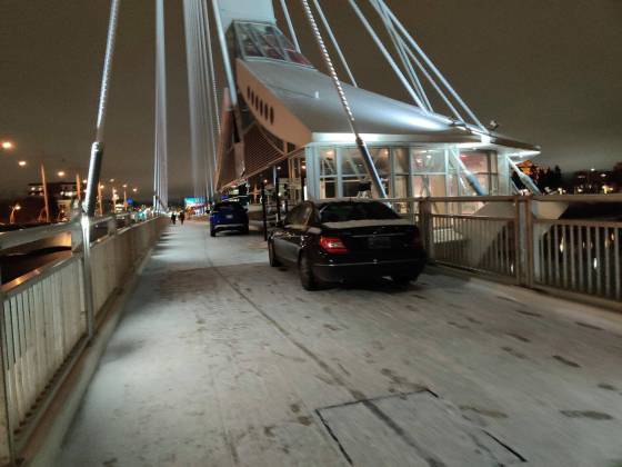 Passenger vehicles parked on Esplanade Riel (Twitter)