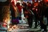 Family and friends gather to remember Delany Desmarais at a vigil outside the William Avenue residence where she was found on Tuesday. (John Woods / Winnipeg Free Press)