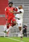 (Andreas Gebert/pool via AP)
                                Unlike the national team&rsquo;s first time playing in the World Cup in 1986, the squad can now boast a global superstar in Alphonso Davies (left).