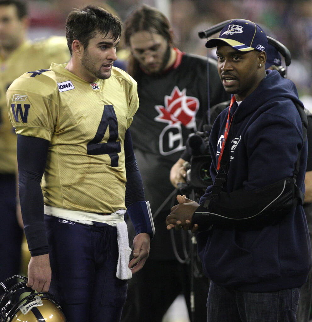 Current Argonauts coach Ryan Dinwiddie (left) made his fisrt CFL start in the 2007 Grey Cup behind centre for the Bombers after Kevin Glenn (right) was injured in the East Division final. (Adrian Wyld / The Canadian Press files)