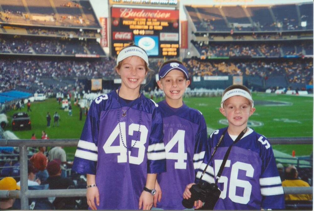 Dalton (right) with his older sister Chandler and his brother Mason when they were young sports fans. (Supplied)