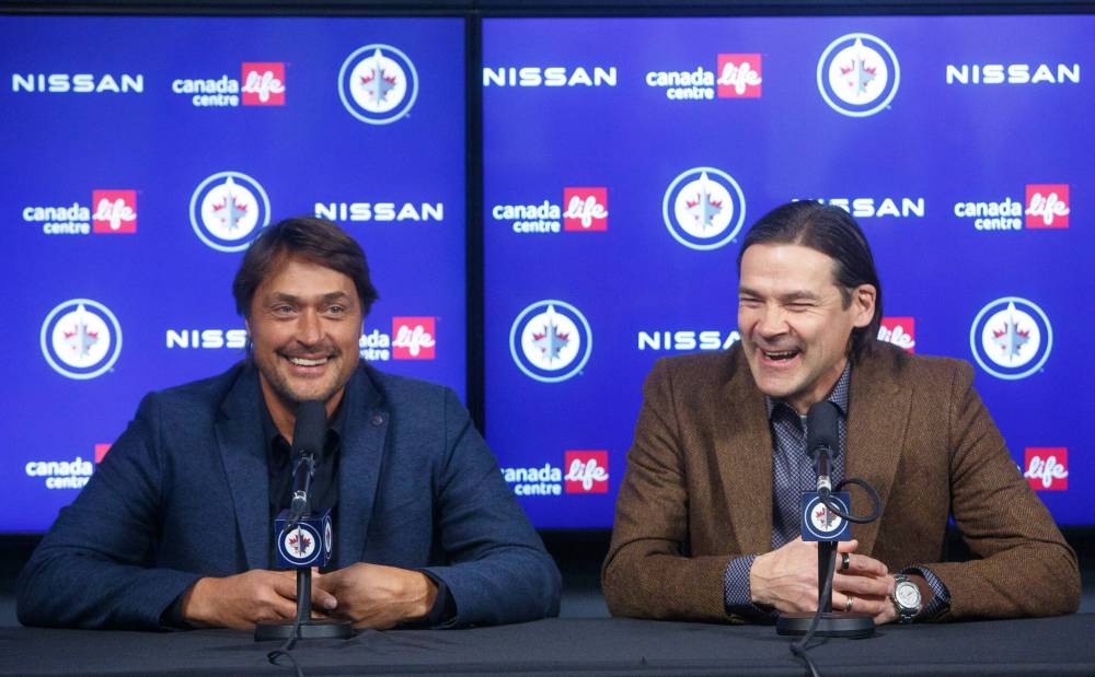 MIKE DEAL / WINNIPEG FREE PRESS
Teemu Selanne (left) and Teppo Numminen are back in town to be inducted into the Jets Hall of Fame prior to tonight’s game against the Anaheim Ducks.