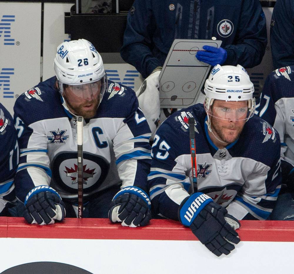 “It’s always good to catch up. He (Stastny) comes over and sees the family. Obviously, we’ve become really close family friends over the last couple years. The kids were on FaceTime. It was good to see him,” Blake Wheeler (left) said Monday. (Ryan Remiorz / Canadian Press files)