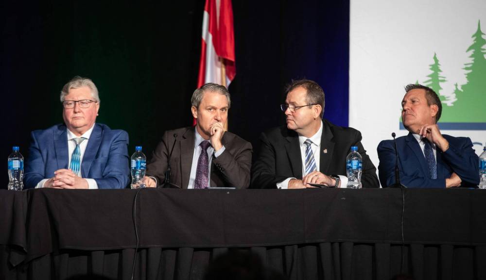 Progressive Conservative ministers Scott Johnston (from left), Cameron Friesen, Wayne Ewasko and Cliff Cullen attended the Association of Manitoba Municipalities’ fall convention in Winnipeg on Tuesday. (Jessica Lee / Winnipeg Free Press)