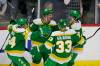 Minnesota Wild center Mason Shaw celebrates after scoring a goal with teammates Matt Dumba, Alex Goligoski and Connor Dewarin during the first period. (Andy Clayton-King / The Associated Press)