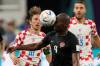 Croatia&rsquo;s Luka Modric fights for the ball with Canada&rsquo;s Kamal Miller during the World Cup group F soccer match between Croatia and Canada Sunday. (AP Photo/Darko Vojinovic)