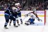 Colorado Avalanche goaltender Alexandar Georgiev looks for the puck as Winnipeg Jets Blake Wheeler looks for a rebound during the second period, Tuesday. THE CANADIAN PRESS/Fred Greenslade