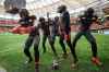 B.C. Lions' Keon Hatcher, from left to right, Alexander Hollins, Andrew Peirson, Dominique Rhymes and Jevon Cottoy celebrate Hatcher's touchdown against the Calgary Stampeders during the second half of the CFL western semifinal football game, in Vancouver, B.C., Sunday, Nov. 6, 2022. THE CANADIAN PRESS/Darryl Dyck