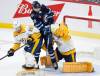 John Woods / The Canadian Press files
                                Kevin Stenlund makes his presence known in the Nashville Predators’ crease between goalie Juuse Saros and Roland McKeown.