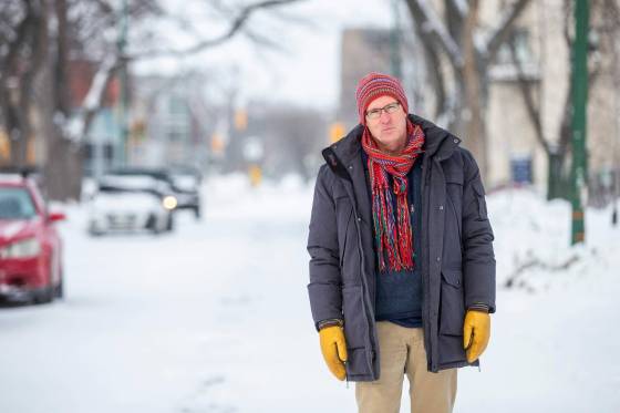 Brian Pincott lives in a home on Spence Street. When asked what he’d like to see change, the list is long: investments in housing, in active transport, in community supports to make that housing successful. (Mikaela MacKenzie / Winnipeg Free Press)