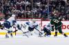 Fred Greenslade / The Canadian Press 
                                Minnesota Wild’s Sam Steel takes a shot on Winnipeg Jets goaltender Connor Hellebuyck Tuesday night at Canada Life Centre.