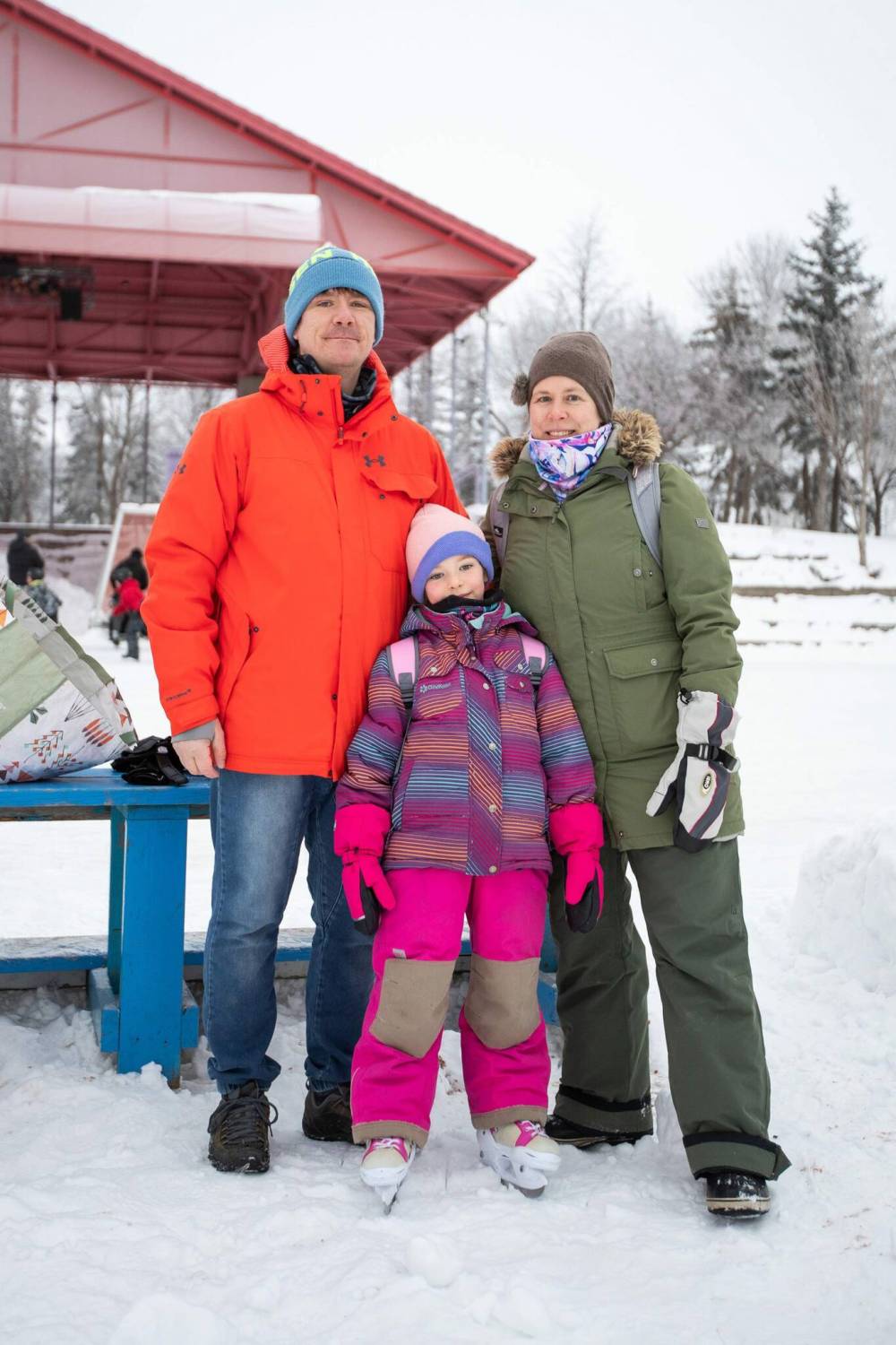Greg Ducharme (left) and Sarah Ducharme at the Forks in Winnipeg with their daughter Madeline for New Year’s Eve. (Daniel Crump / Winnipeg Free Press)