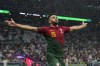 Portugal's Goncalo Ramos celebrates after scoring his side's fifth goal during the World Cup round of 16 soccer match between Portugal and Switzerland, at the Lusail Stadium in Lusail, Qatar, Tuesday, Dec. 6, 2022. (AP Photo/Alessandra Tarantino)
