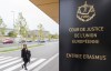 FILE - In this photo taken on Oct. 5, 2015 a woman walks by the entrance to the European Court of Justice in Luxembourg. The European Union’s top court says Google has to delete search results about people in Europe if they can prove that the information is clearly wrong. People in Europe have the right to ask search engines to delete links to outdated or embarrassing information about themselves, even if it is true, under a principle known as “right to be forgotten.” (AP Photo/Geert Vanden Wijngaert)