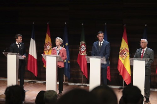 The president of the European Comission Ursula von der Leyen, right, 2nd left, speaks next to the French President Emmanuel Macron, left, Spain's Prime Minister Pedro Sanchez, 3rd left and Portugal's President Antonio Costa. during the H2Med summit Mediterranean summit in Alicante, Spain, Friday Dec. 9, 2022. The H2Mad summit is to discuss a plan for an undersea pipeline that would eventually transport hydrogen and will connect the ports of Barcelona in Spain and Marseille in France. (AP Photo/J.M Fernandez)