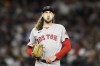 FILE - Boston Red Sox pitcher Matt Strahm reacts during the eighth inning of an MLB baseball game against the New York Yankees on Sept. 23, 2022, in New York. On Friday, Dec. 9, the left-handed pitcher joined the Philadelphia Phillies on a two-year deal. (AP Photo/Adam Hunger, File)