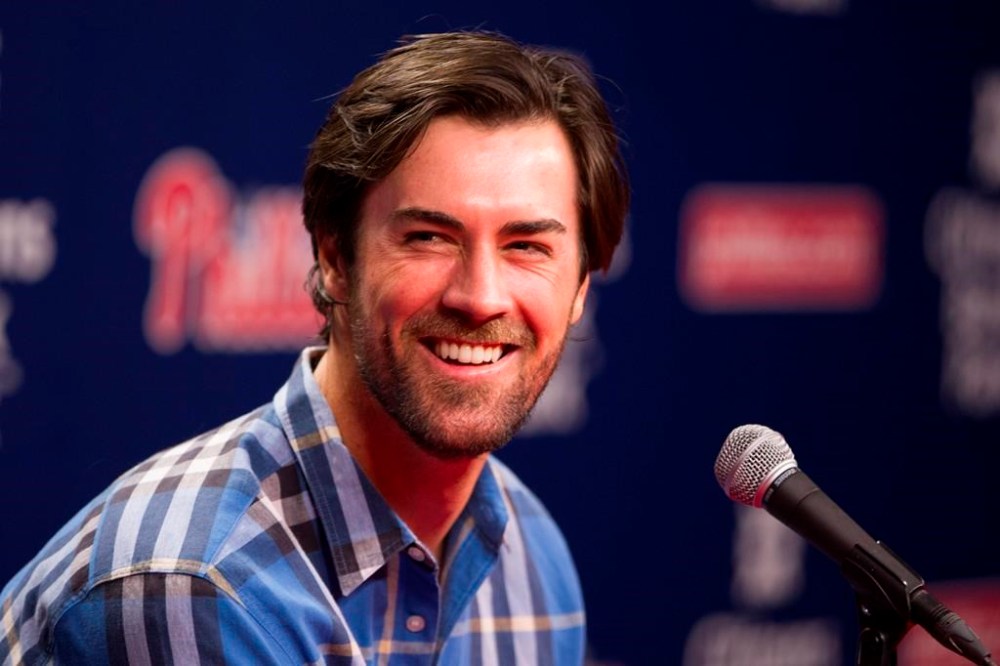 FILE - Former Philadelphia Phillies starting pitcher Cole Hamels takes questions from the media after being traded to the Texas Rangers prior to the first inning of a baseball game against the Atlanta Braves on July 31, 2015, in Philadelphia. The former Phillies ace and 2008 World Series MVP is eyeing a comeback in 2023. (AP Photo/Chris Szagola, File)