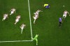 Brazil's Marquinhos is dejected after failing to score from the penalty spot as Croatia's players celebrate winning the World Cup quarterfinal soccer match between Croatia and Brazil, at the Education City Stadium in Al Rayyan, Qatar, Friday, Dec. 9, 2022. (AP Photo/)