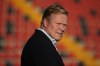 FILE - Barcelona's head coach Ronald Koeman checks the field ahead of the Spanish La Liga soccer match between Rayo Vallecano and FC Barcelona at the Vallecas stadium in Madrid, Spain, Wednesday, Oct. 27, 2021. Now it's Koeman's turn to hop on the Netherlands' coaching merry-go-round. A day after Louis Van Gaal's third stint as Oranje coach ended with a penalty-kicks defeat to Argentina in the World Cup quarterfinals, Koeman's second term began Saturday, Dec. 10, 2022. (AP Photo/Manu Fernandez, File)