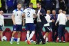 England's head coach Gareth Southgate consoles Kyle Walker following the World Cup quarterfinal soccer match between England and France, at the Al Bayt Stadium in Al Khor, Qatar, Sunday, Dec. 11, 2022. (AP Photo/Natacha Pisarenko)