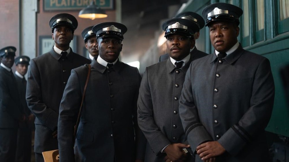 Actors Ronnie Rowe (left), Jr. as Zeke and Aml Ameen (second right) as Junior and other cast members are shown in a scene from