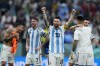 Argentina's Lionel Messi celebrates defeating Croatia 3-0 in a World Cup semifinal soccer match at the Lusail Stadium in Lusail, Qatar, Tuesday, Dec. 13, 2022. (AP Photo/Natacha Pisarenko)