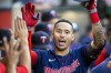 FILE - Minnesota Twins' Carlos Correa, right, is congratulated after hitting a solo home run against the Los Angeles Angels during the first inning of a baseball game in Anaheim, Calif., Saturday, Aug. 13, 2022. Star shortstop Carlos Correa and the San Francisco Giants have agreed to a $350 million, 13-year contract, a person familiar with the negotiations told The Associated Press. The person spoke on condition of anonymity Tuesday night Dec. 13, 2022 because the agreement was subject to a successful physical.(AP Photo/Alex Gallardo, File)
