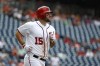 FILE -Washington Nationals' Matt Adams runs toward first base during the first baseball game of a doubleheader against the Colorado Rockies, Wednesday, July 24, 2019, in Washington. First baseman Matt Adams returned to the Washington Nationals on Wednesday, Dec. 14, 2022 via a minor league contract with an invitation to spring training after being out of baseball since July 2021.(AP Photo/Patrick Semansky, File)