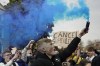 FILE - Chelsea fans protest outside Stamford Bridge stadium in London, against Chelsea's decision to be included amongst the clubs attempting to form a new European Super League, April 20, 2021. Super League was dealt a blow when an EU legal adviser proposed the European Court of Justice should back UEFA and FIFA in blocking the breakaway competition. Advocate General Athanasios Rantos proposed on Thursday, Dec. 15, 2022 that the court recognize FIFA-UEFA rules under which Super League should be subject to prior approval were compatible with European Union competition law. (AP Photo/Matt Dunham, file)