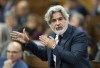 Canadian Heritage Minister Pablo Rodriguez responds to a question during question period, Monday, Nov. 21, 2022, in Ottawa. Rodriguez accused Facebook on Thursday of trying to intimidate Canadians with threats of pulling news content from its platform, following the adoption of Bill C-18 in the House of Commons. THE CANADIAN PRESS/Adrian Wyld