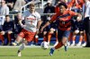 Clemson's Brandon Parrish (11) battles Syracuse's Levonte Johnson (14) for control of the ball during the first half of the Atlantic Coast Conference Men's Soccer Tournament championship match in Cary, N.C., Sunday, Nov. 13, 2022. Canadian forward Johnson, who helped Syracuse to the NCAA College Cup on Monday, is one of three finalists for the 2022 MAC Hermann Trophy. THE CANADIAN PRESS/AP Photo/Karl B DeBlaker