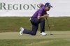 FILE - Padraig Harrington lines up his putt on the 18th hole during the final day at the Regions Tradition, a PGA Tour Champions golf event, Sunday, May 15, 2022, in Birmingham, Ala. Twenty years have passed since Padraig Harrington first faced Tiger Woods on the weekend at a major, and the Irishman has kept a close watch ever since. He doesn't think Woods is finished. (AP Photo/Vasha Hunt, File)