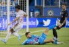 CF Montréal goalkeeper James Pantemis makes a save against New York Red Bulls' Omir Fernandez during second half MLS soccer action in Montreal, Wednesday, August 31, 2022. Montreal has signed Pantemis to a new contract for the 2023 season, with option years in 2024 and 2025.&nbsp;THE CANADIAN PRESS/Graham Hughes