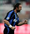 FILE OBIT - Inter Milan's Sinisa Mihajlovic of Serbia celebrates after scoring against Roma during the Italy's Cup final soccer match at San Siro stadium in Milan, Italy, on June 15, 2005. Former soccer player and coach Siniša Mihajlović has died at 53 after a long battle with leukemia. Mihajlović’s family announced Friday, Dec. 16, 2022, that he died in a Rome hospital. The Serbian had most recently coached Serie A club Bologna for 3 ½ years. He became a sentimental favorite of fans and players alike for his desire to remain on the job even after he was diagnosed with leukemia in 2019. (AP Photo/Luca Bruno)