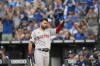 FILE - Boston Red Sox first baseman Eric Hosmer gets a standing ovation from the Kansas City Royals fans as he comes to bat during the second inning of a baseball game against the Royals, Friday, Aug. 5, 2022, in Kansas City, Mo. On Friday, Dec. 16, 2022, the Red Sox designated veteran first baseman Hosmer for assignment to make room for right-hander Wyatt Mills, who was acquired from Kansas City for minor league righty Jacob Wallace. (AP Photo/Reed Hoffmann, File)