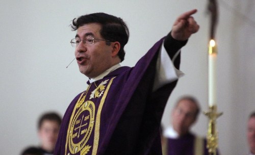 FILE - Frank Pavone, head of Priests for Life, gives the Homily during a mass at Ave Maria University's Oratory in Naples, Fla., on March 31, 2009 to recognize the fourth anniversary of Terri Schiavo's death. The Vatican has defrocked an anti-abortion U.S. priest, Frank Pavone, for what it said were “blasphemous communications on social media” as well as “persistent disobedience” of his bishop. A letter to U.S. bishops from the Vatican ambassador to the U.S., Archbishop Christophe Pierre, obtained Sunday Dec. 18, 2022, said the decision against Pavone, who heads the anti-abortion group Priests for Life, had been taken Nov. 9, and that there was no chance for an appeal. (Greg Kahn/Naples Daily News via AP, File)