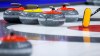 A curling broom and rocks are shown in Lethbridge, Alta., Sunday, March 6, 2022. Emily Deschenes skipped Canada to an undefeated record at the world junior B women's curling championship Monday and secure her team's spot in the 2023 world junior championship.T HE CANADIAN PRESS/Jeff McIntosh