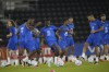 From left, France's Matteo Guendouzi, Marcus Thuram, Randal Kolo Muani, Kingsley Coman, Raphael Varane, Kylian Mbappe and Olivier Giroud practise during a training session at the Jassim Bin Hamad stadium in Doha, Qatar, Thursday, Dec. 8, 2022. France will play against England during their World Cup quarter-final soccer match on Dec. 10. (AP Photo/Christophe Ena)