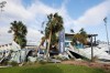 FILE - Damage caused by Hurricane Ian seen outside Charlotte Sports Park located on the grounds of the Tampa Bay Rays Spring Training baseball complex, Thursday, Sept. 29, 2022 in Port Charlotte. The Tampa Bay Rays will split their spring training between the ESPN Wide World of Sports Complex in Lake Buena Vista and Tropicana Field because of their own facility on Florida's Gulf Coast was damaged by Hurricane Ian, the team said Tuesday, Dec. 20, 2022. (Ivy Ceballo/Tampa Bay Times via AP, File)