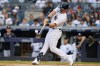 FILE - New York Yankees' Matt Carpenter hits a three-run home run against the Boston Red Sox during the first inning of a baseball game Saturday, July 16, 2022, in New York. Carpenter agreed Tuesday, Dec. 20, 2022, to a $12 million, two-year contract with the San Diego Padres after reviving his career with the New York Yankees in a season cut short by injury. (AP Photo/Frank Franklin II, File)