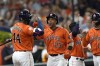 FILE - Houston Astros' Michael Brantley (23) celebrates with Yordan Alvarez (44) after hitting a grand slam against the Chicago White Sox during the sixth inning of an MLB baseball game on June 17, 2022, in Houston. Brantley has signed a one-year deal to remain with the Houston Astros after missing more than half of last season with a shoulder injury. Terms of the deal announced Wednesday, Dec. 21, were not revealed. (AP Photo/David J. Phillip, File)