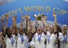 FILE - United States' Megan Rapinoe lifts up a trophy after winning the Women's World Cup final soccer match between U.S. and The Netherlands at the Stade de Lyon in Decines, outside Lyon, France, July 7, 2019. The House has passed a bill that ensures equal compensation for U.S. women competing in international events, a piece of legislation that came out of the U.S. women's soccer team's long battle to be paid as much as the men. The Equal Pay for Team USA Act, passed late Wednesday night, Dec. 21, 2022, now heads to President Joe Biden's desk. (AP Photo/Alessandra Tarantino, File)