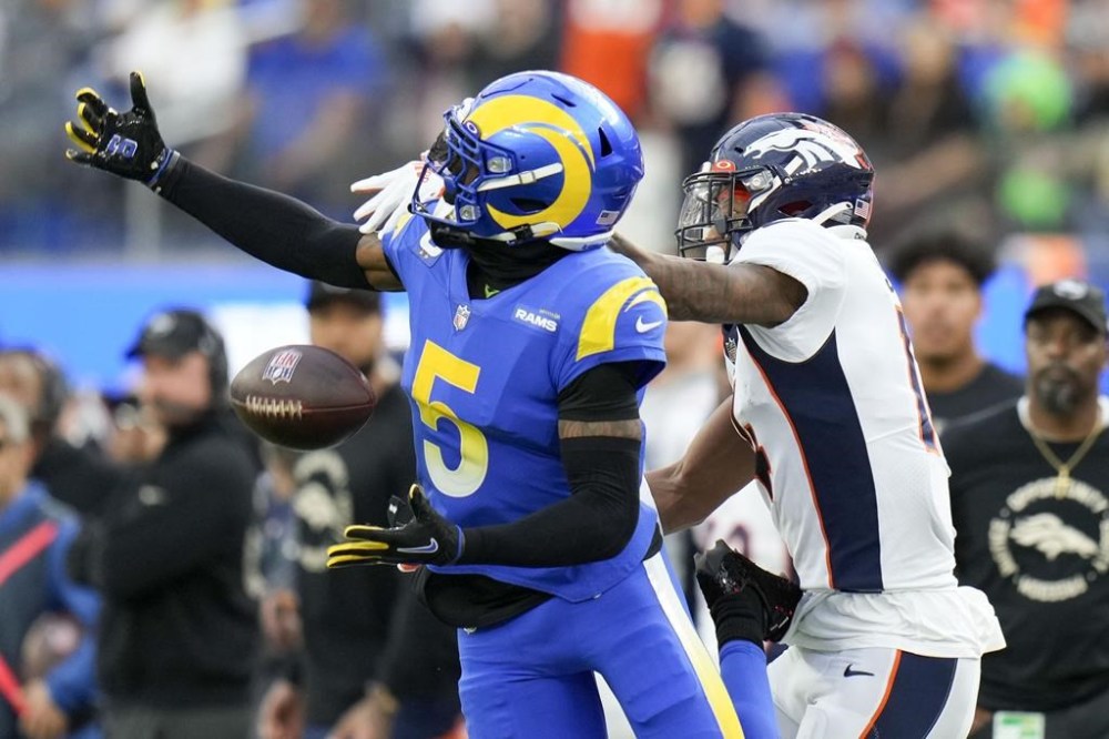 Los Angeles Rams cornerback Jalen Ramsey breaks up a pass intended for Denver Broncos wide receiver Montrell Washington during the first half of an NFL football game between the Los Angeles Rams and the Denver Broncos on Sunday, Dec. 25, 2022, in Inglewood, Calif. (AP Photo/Jae C. Hong)